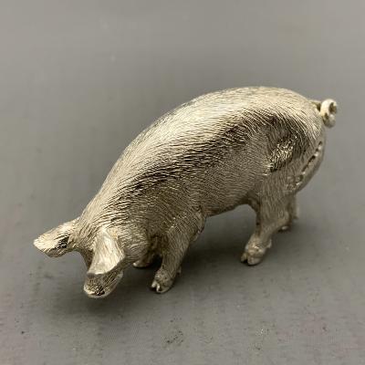 Silver PIG EATING